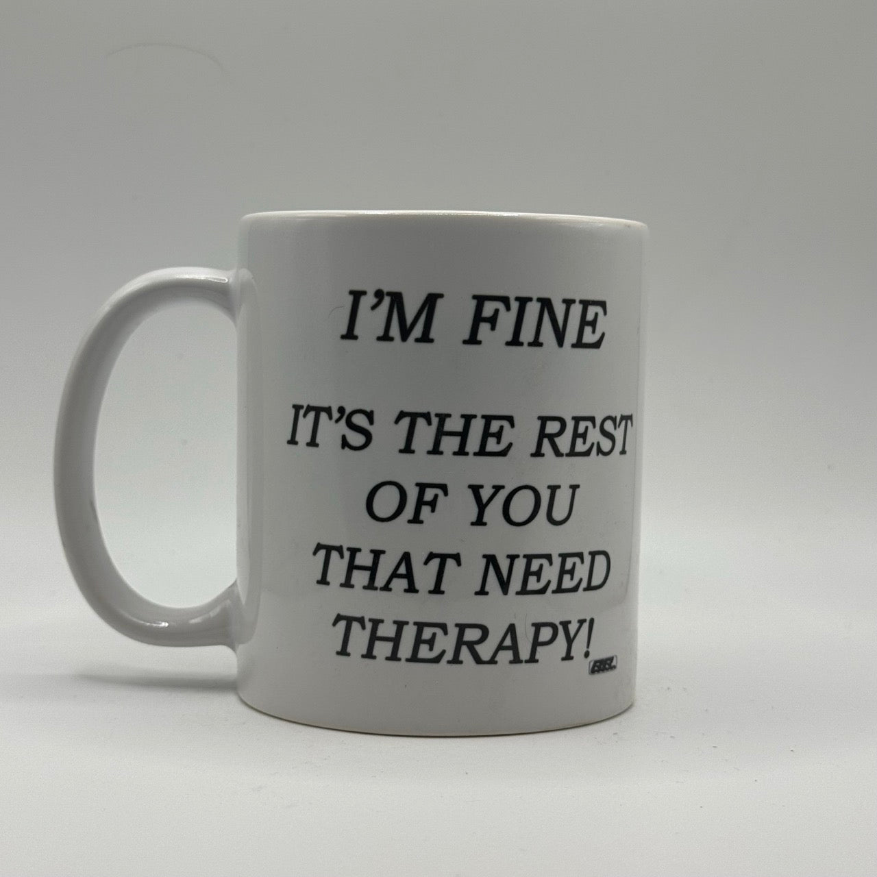 I’m Fine, It’s the Rest of You That Need Therapy – White Ceramic Coffee Mug (11oz)