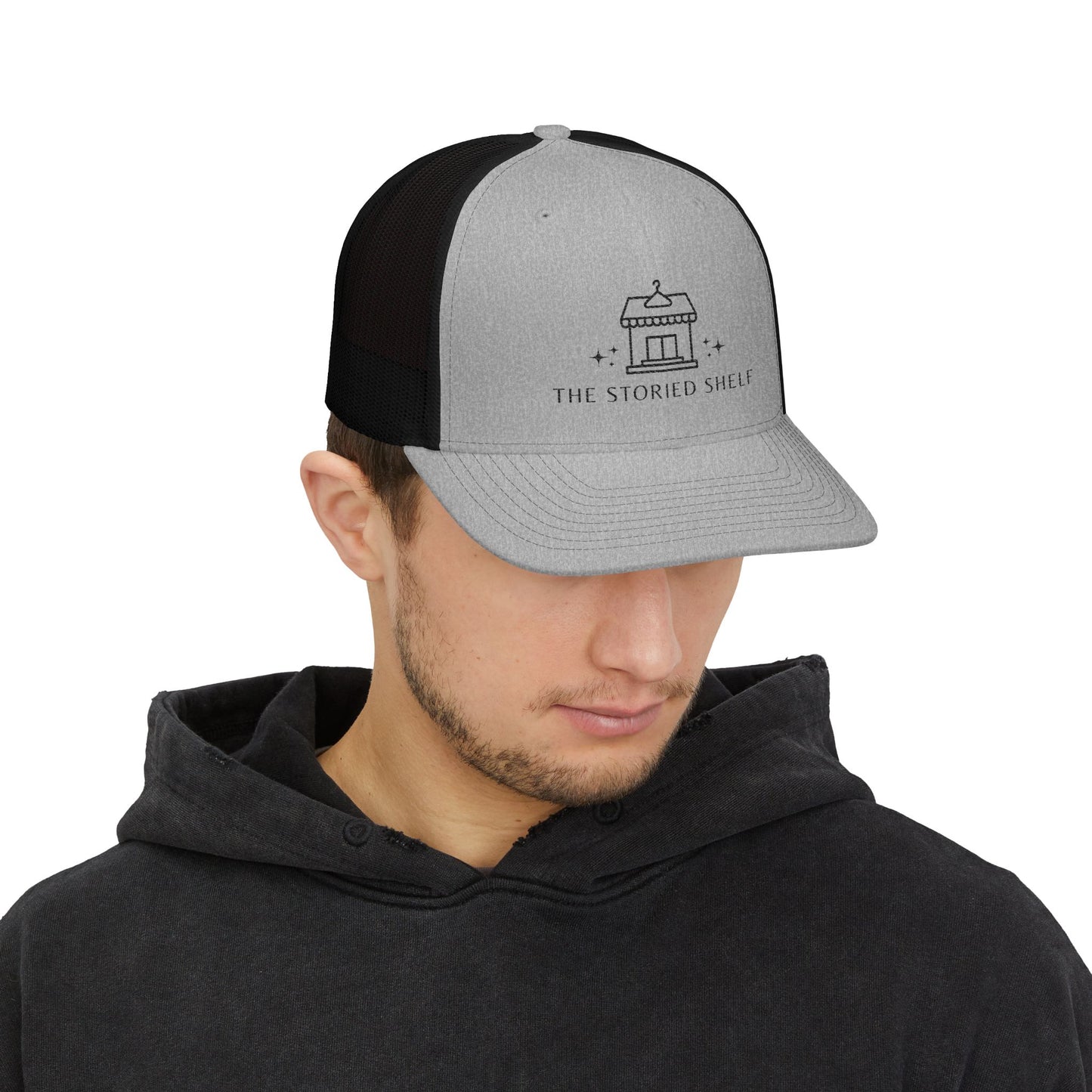 The Storied Shelf Snapback Trucker Cap
