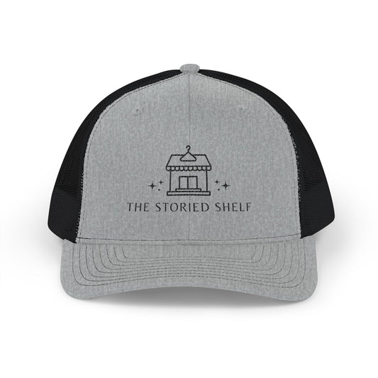 The Storied Shelf Snapback Trucker Cap