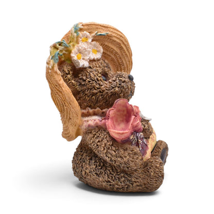 Vintage Teddy Bear Figurine with Straw Hat and Floral Bonnet