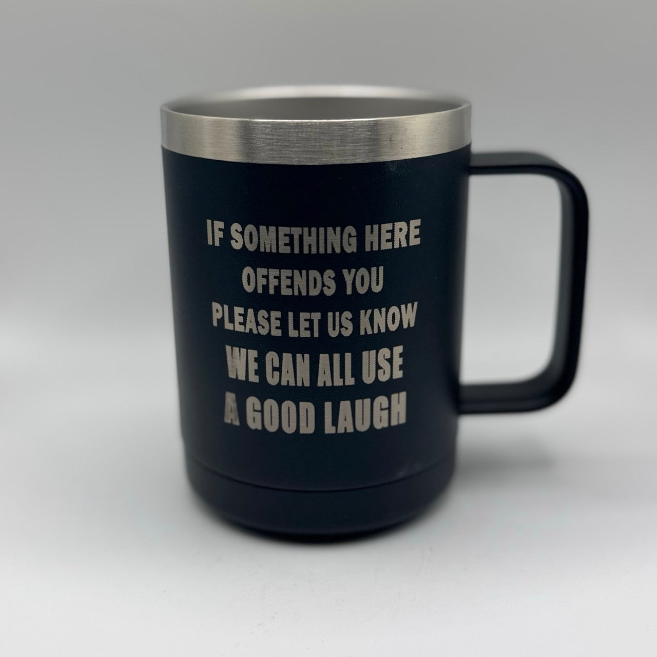 If Something Here Offends You, Please Let Us Know – 15 oz Black Polar Camel Coffee Mug