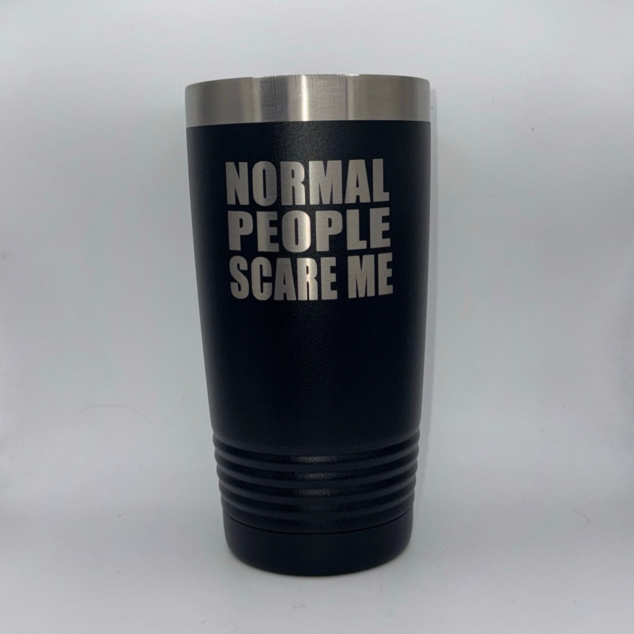 Black tumbler with 'NORMAL PEOPLE SCARE ME' text